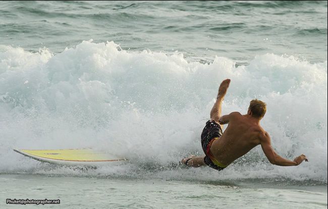 Surfer wiping out