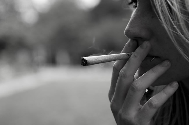 Woman smoking a joint